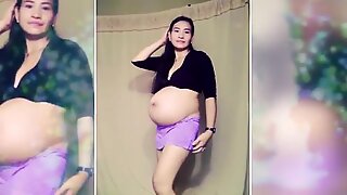 Dancing and Teasing Pregnant Babe